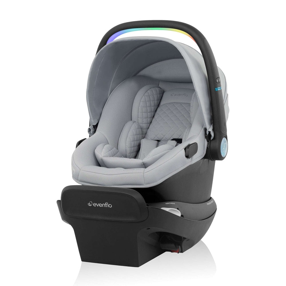 Evenflo Revolve180 Litemax NXT infant car seat in gray quilted fabric with rotating base and colorful arced handle