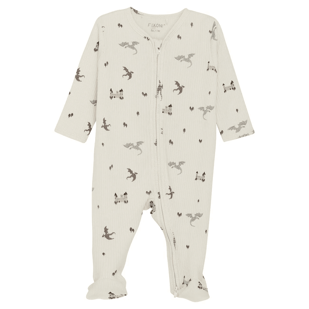 Fixoni ribbed long-sleeve nightsuit with feet; ivory cream with blue dinosaurs and castles print
