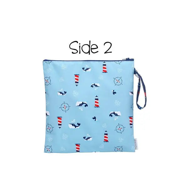 Flapjackkids Kids 2 Sided Wet Bag in blue nautical print; zipper top and wrist strap visible.