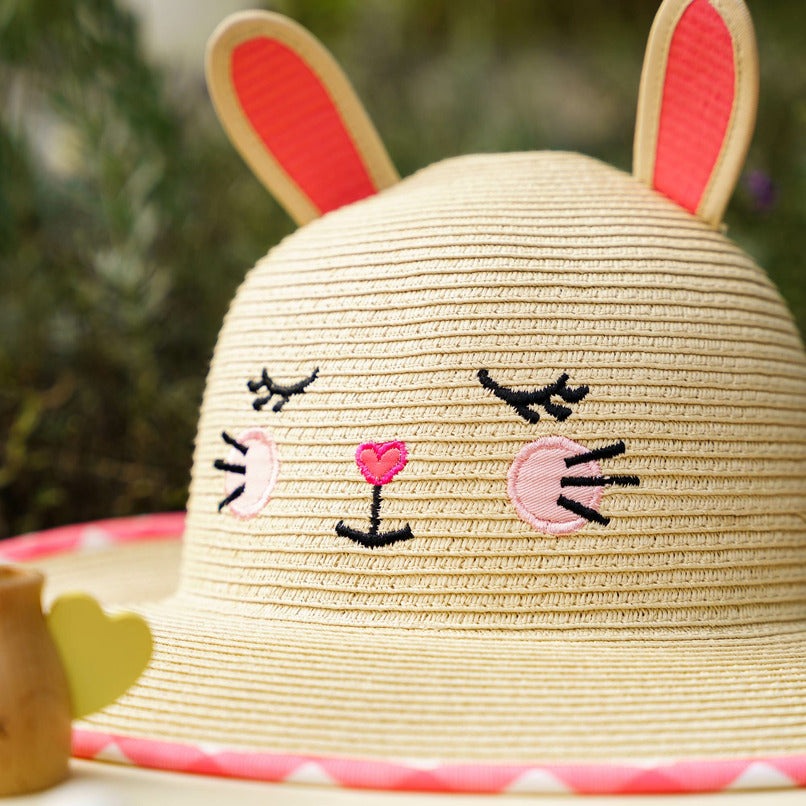 Flapjackkids Lifeguard bunny straw hat for kids with pink ear accents and embroidered face