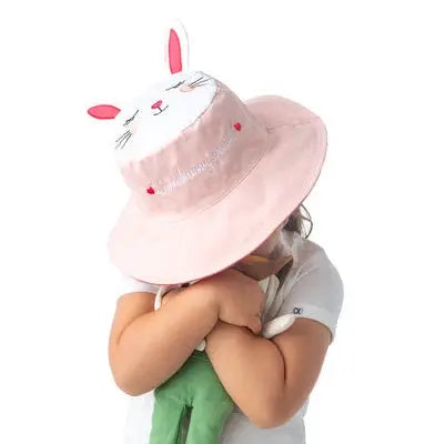 Flapjackkids Reversible Kids Sun Hat Bunny & Deer in pink, worn by child with bunny-ear details.