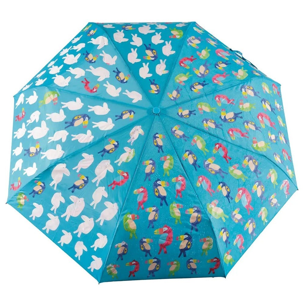 FLOSS AND ROCK Big Kids Color Changing Umbrella Toucan, turquoise canopy with white and colorful toucans, opened for rain protection.