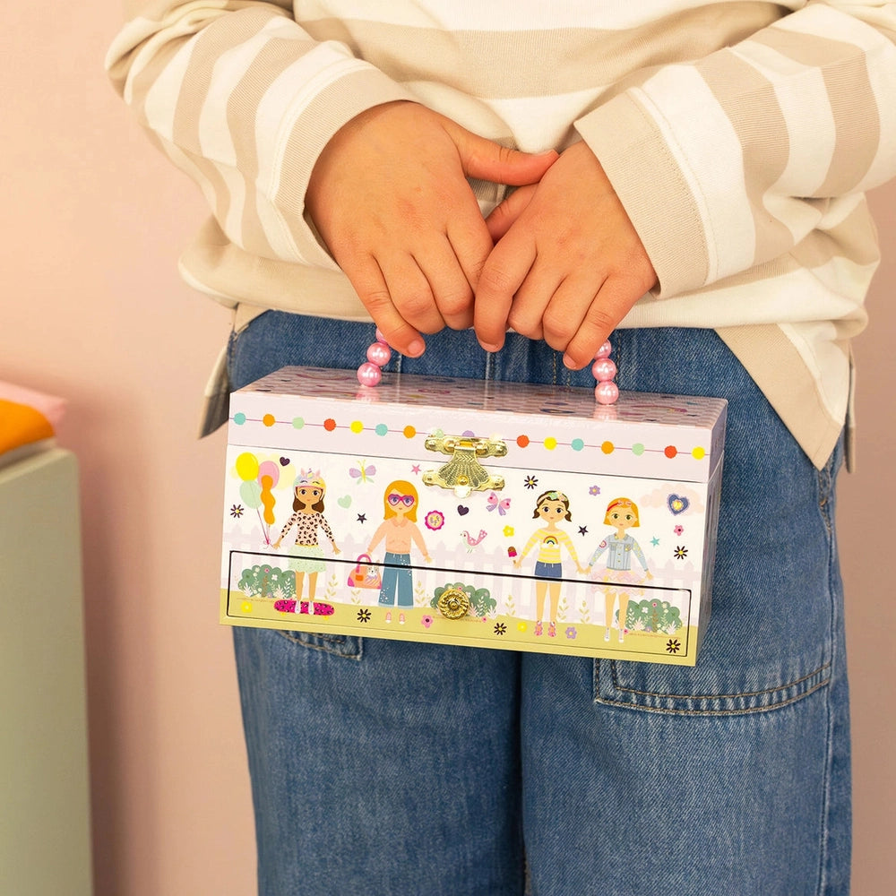 Floss And Rock Musical Jewellery Box Best Friends in pastel with pink beaded handle and cartoon girl scene.