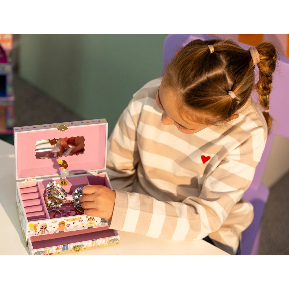FLOSS AND ROCK Best Friends musical jewellery box; pink hinged case with mirror and a sequined bow display.