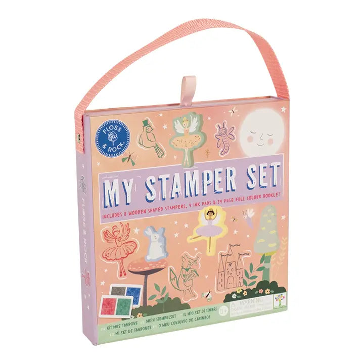 Floss and Rock Stamper Set in pink pastel box with handle, featuring ink pads for stamping playful shapes.