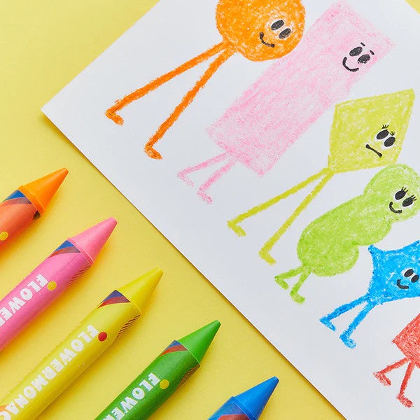 Flower Monaco Palm Crayon 24-color set with bright wax crayons beside a child's colorful stick-figure drawing
