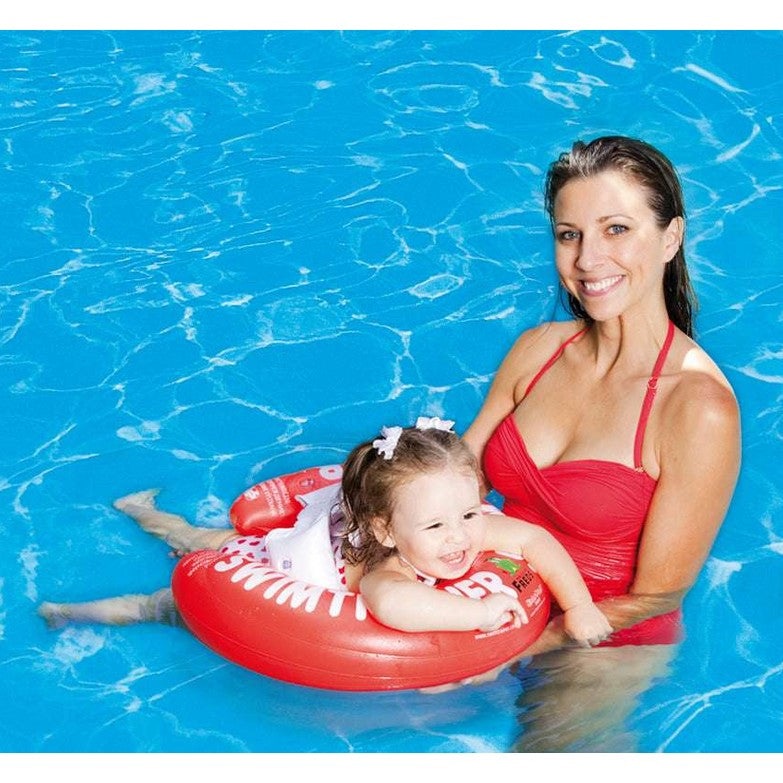 Freds Swimtrainer Classic Red 3M-4Y swim aid; child in red inflatable trainer with supervising adult in pool