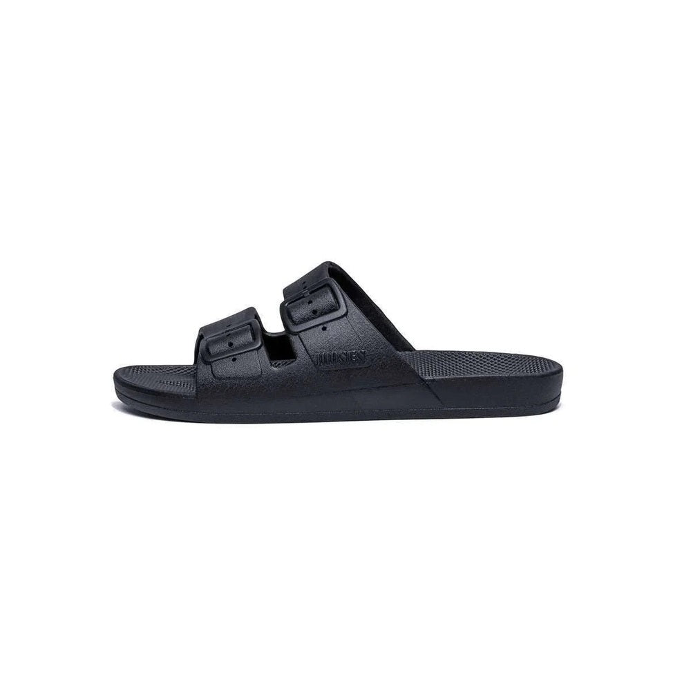 Freedom Moses Basic Black slide sandals with dual adjustable straps and textured footbed