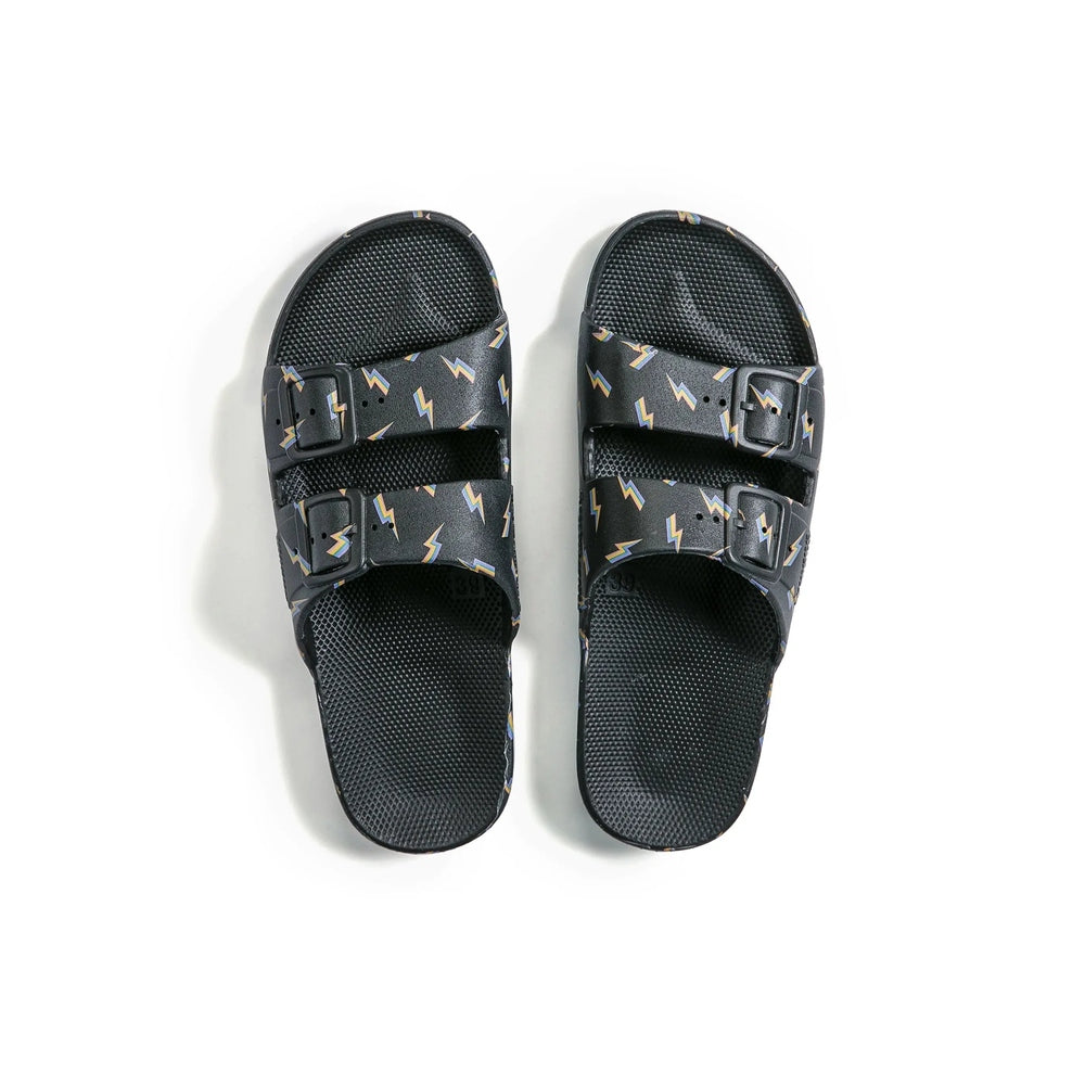 Freedom Moses Prints Bolt Black sandals with two adjustable buckled straps shown from top, textured footbeds.