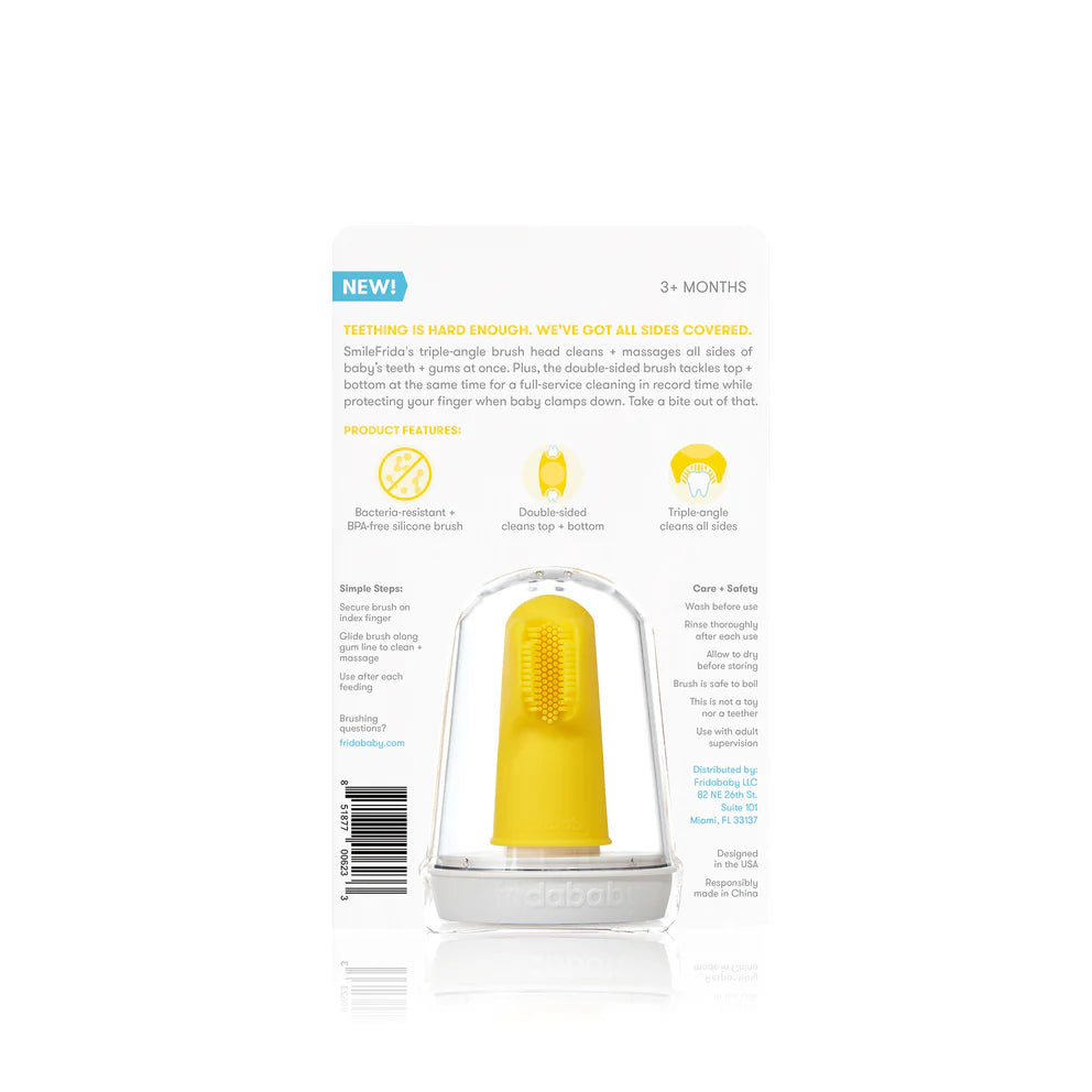 Frida Baby Smilefrida finger toothbrush in yellow with clear protective cap packaging