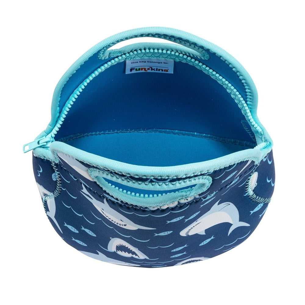 Navy blue insulated lunch bag with light-blue shark pattern, aqua zipper and matching handle.