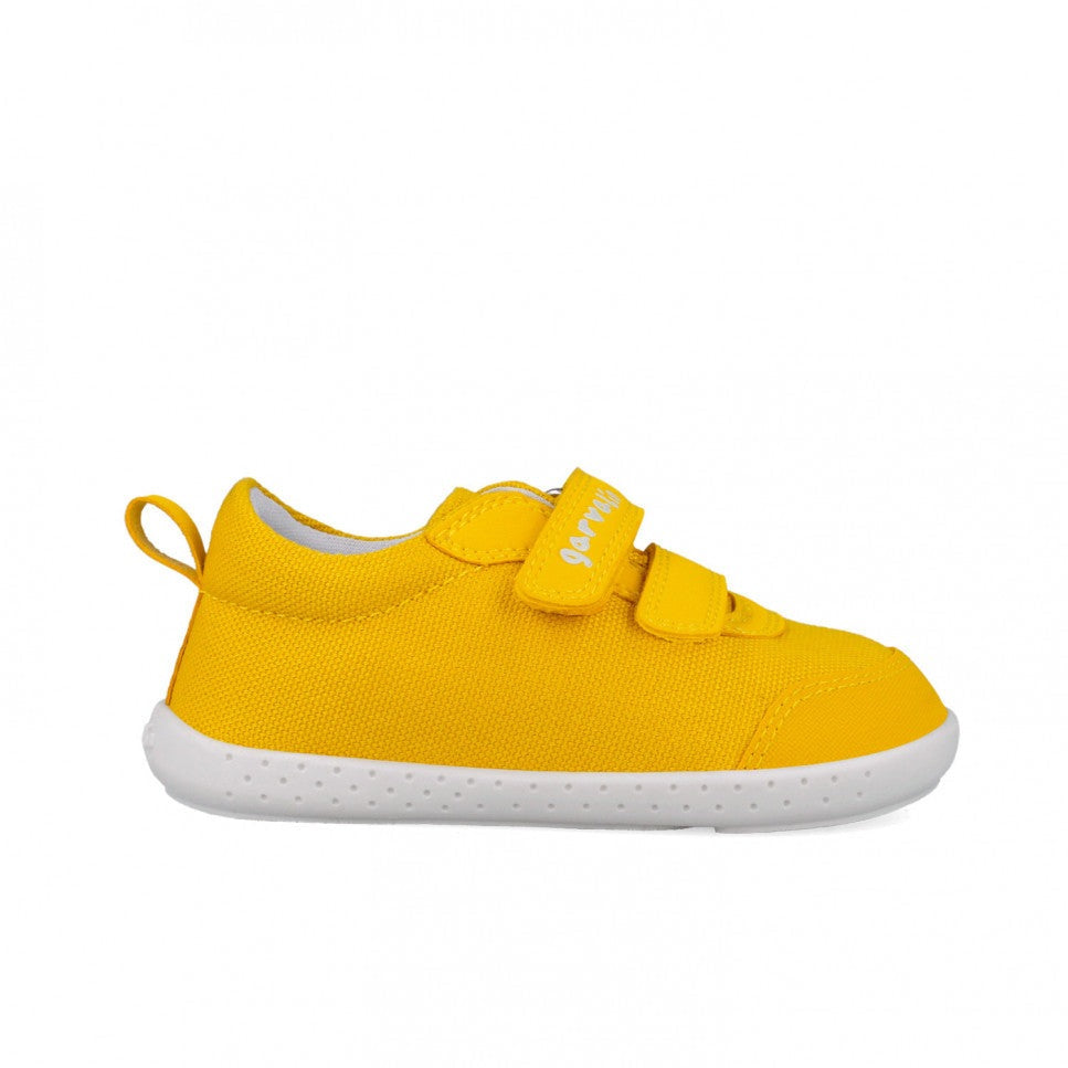 Garvalin barefoot children canvas sneakers in yellow with Velcro straps and white sole