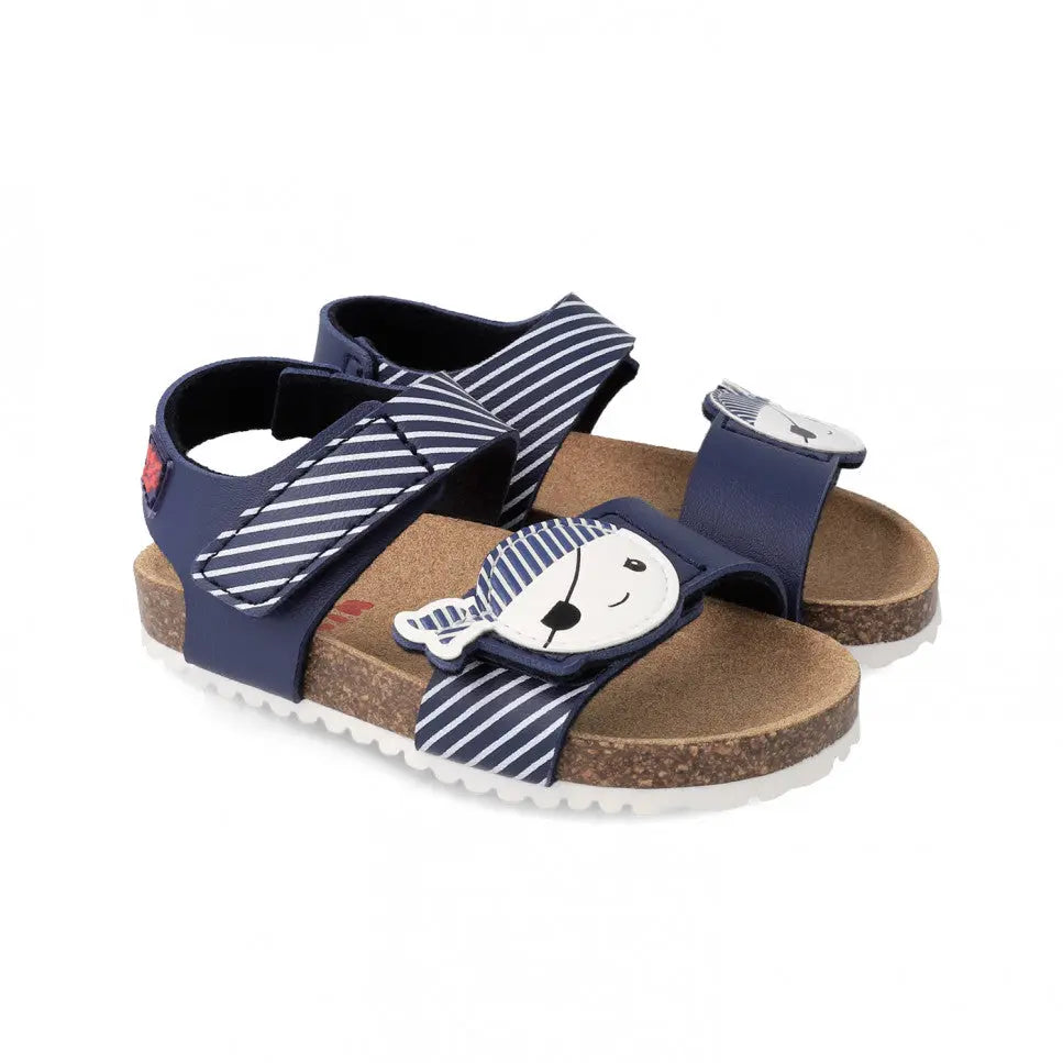 Garvalin Bio Sandals For Childrens Azul Marino: navy sandals with striped straps and cork footbed, featuring a playful badge.