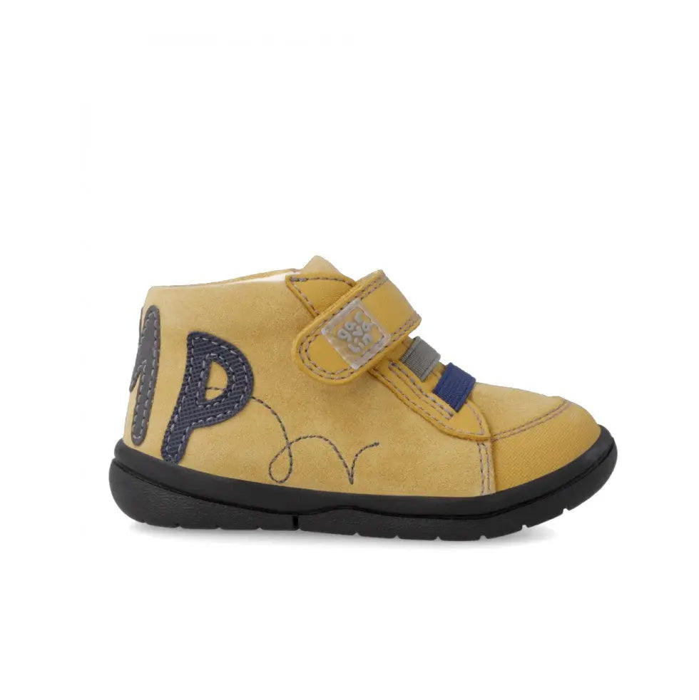 Garvalin Leather Booties in mustard yellow with blue embroidery and Velcro strap, black non-slip sole