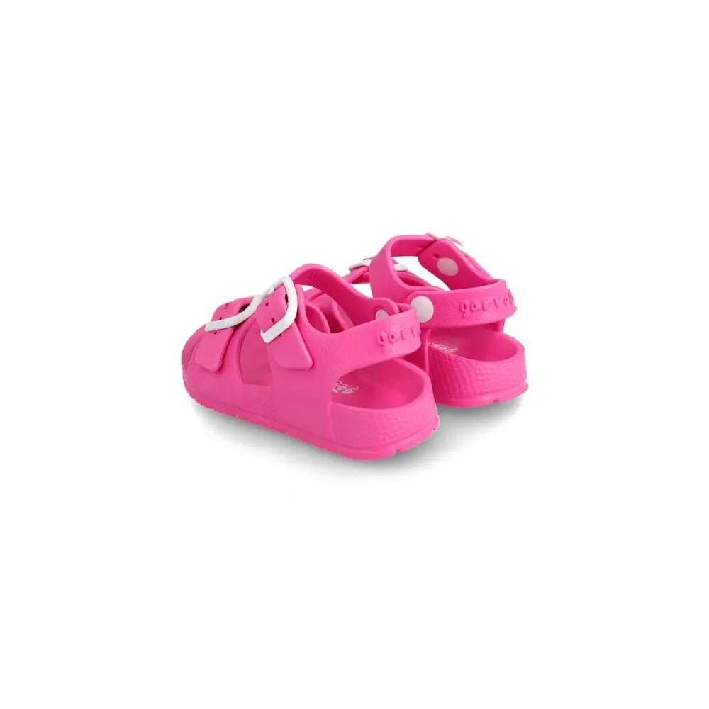 Garvalin Sandalia Hebillas Sandy pink sandals with white buckles, shown as a bright pink baby footwear pair.