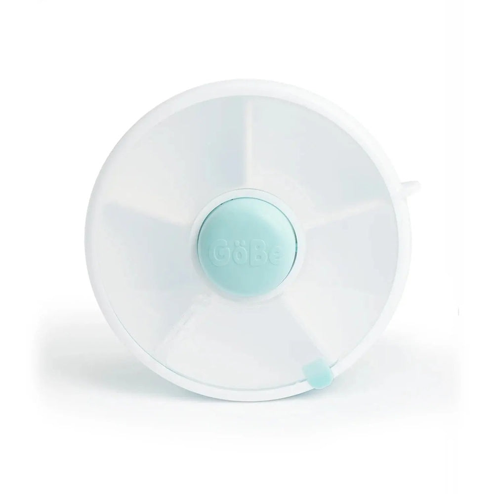 Gobe Snack Spinner Small white lunch accessory with aqua center, showing its rotating lid for easy snacking.