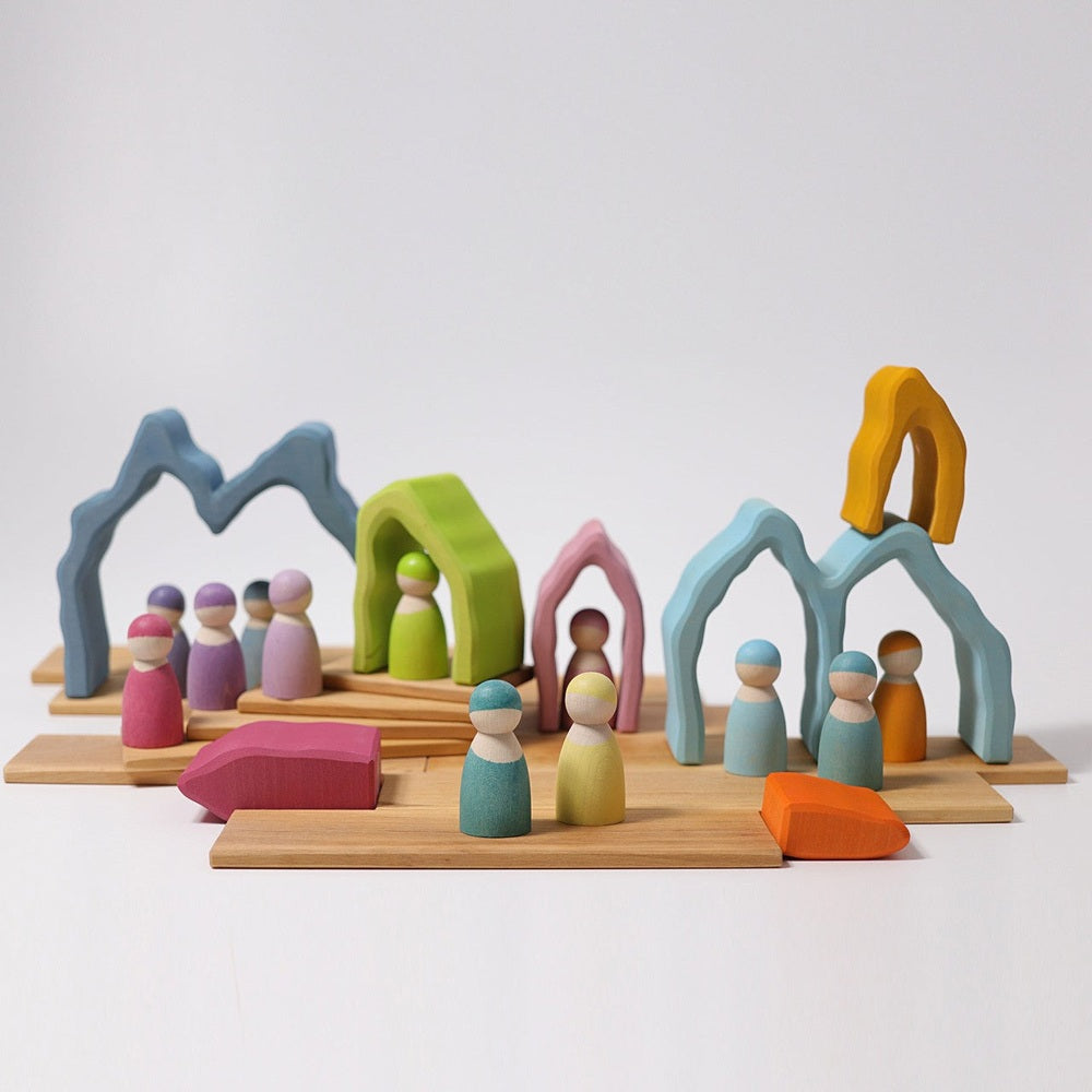 Grimm's Cave Arch Stacker 7pcs by GRIMM'S, colorful wooden arches and peg figures