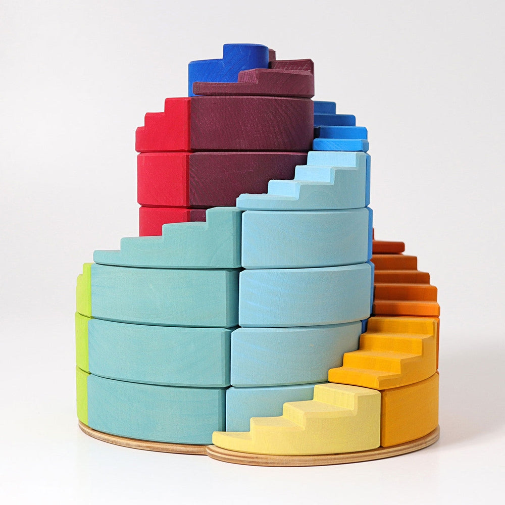 Grimm's Counter Rotating Stepped Spiral 56pc wooden blocks set in rainbow colors