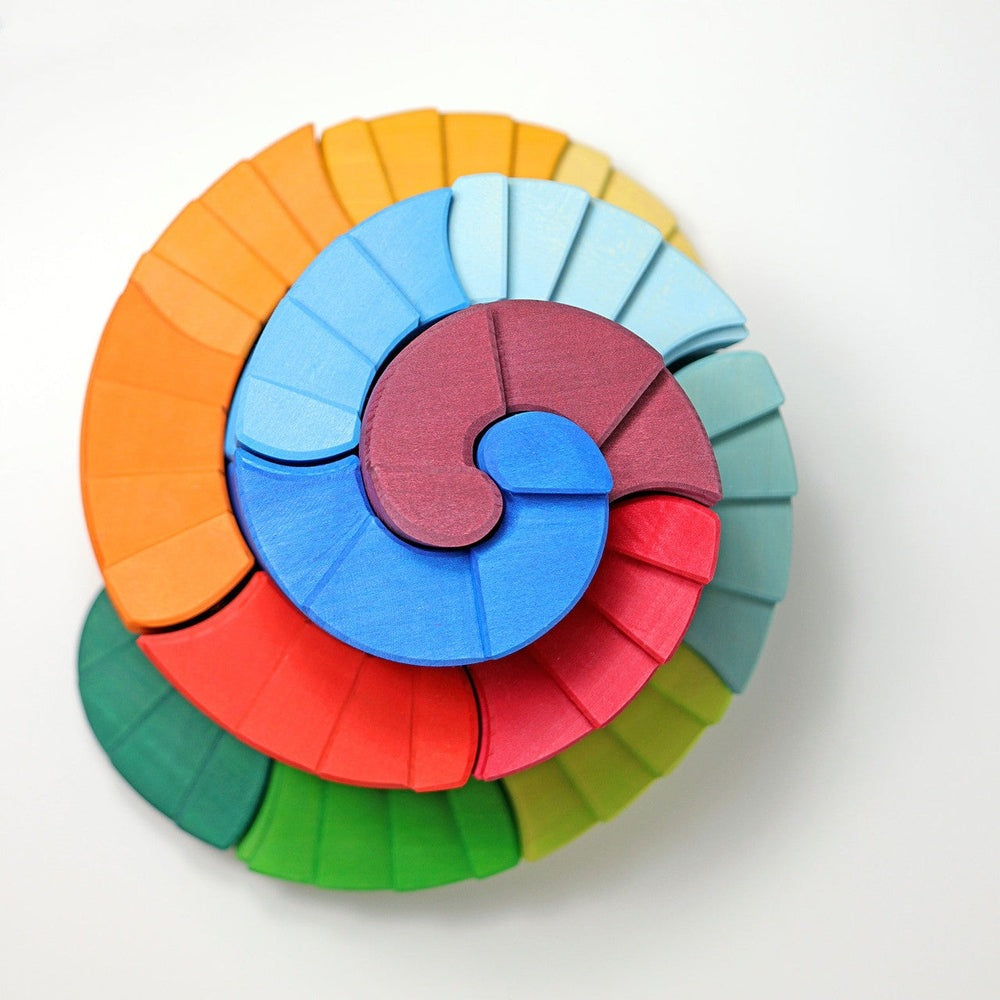 Grimm's Counter Rotating Stepped Spiral 56pc wooden blocks set in rainbow colors by GRIMM'S