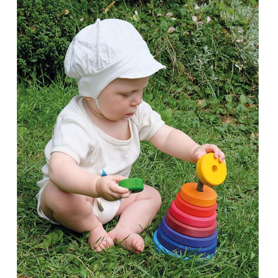 Grimm's Stacking Conical Tower Large wooden rainbow toy with bright colored rings and a yellow top