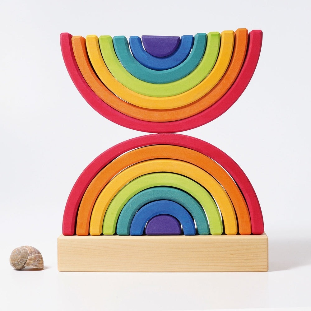Grimm's Stacking Double Rainbow Tower wooden rainbow arches in bright colors on a light wood base