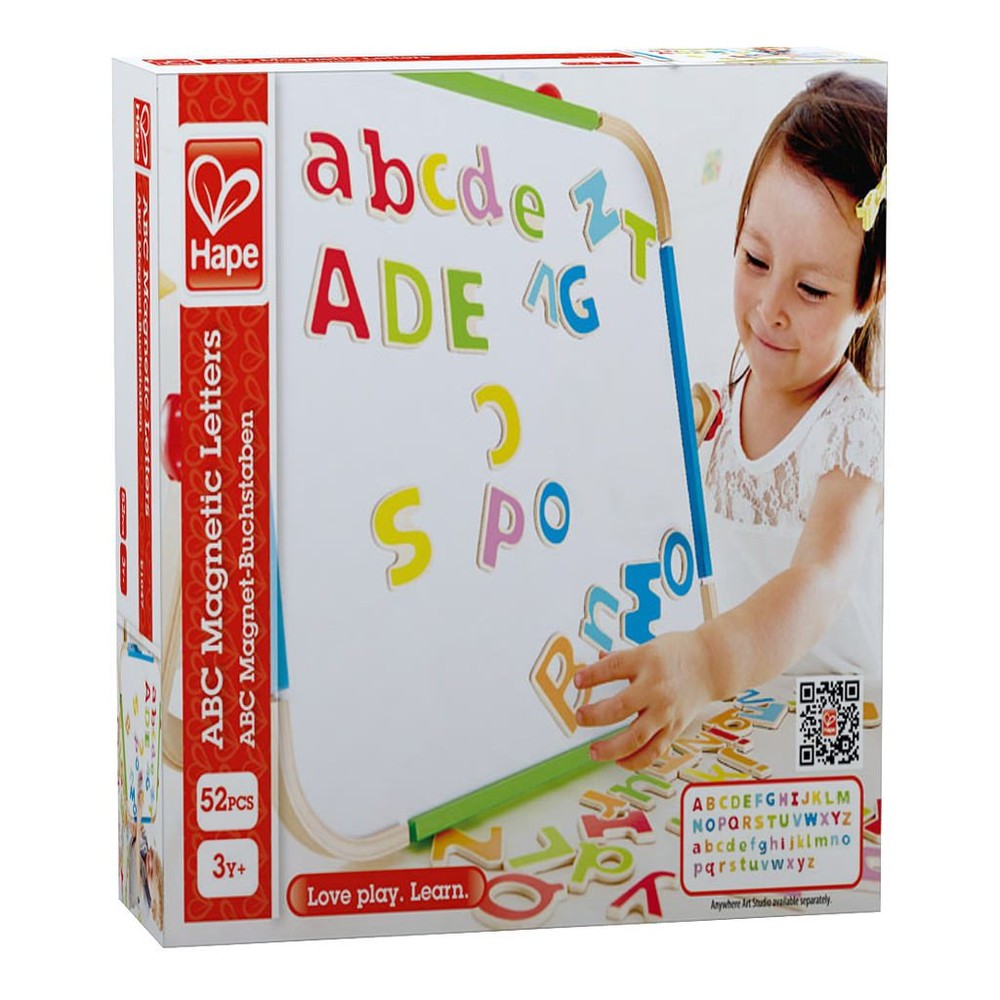 Hape ABC Magnetic Letters set: child places colorful letters on a whiteboard; 52 pieces for alphabet learning.