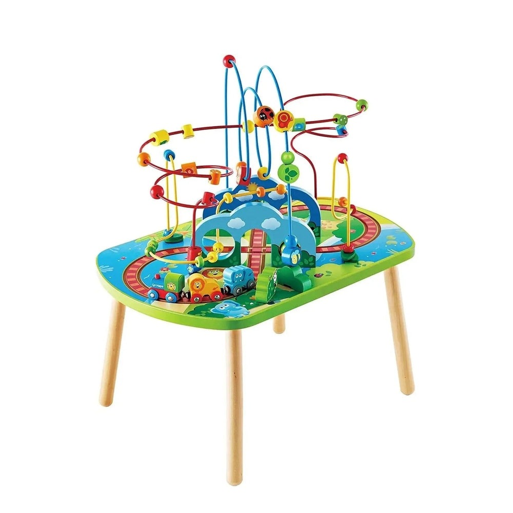 Hape Jungle Adventure Railway Table with colorful bead maze and wooden trains in a toddler-friendly setup.