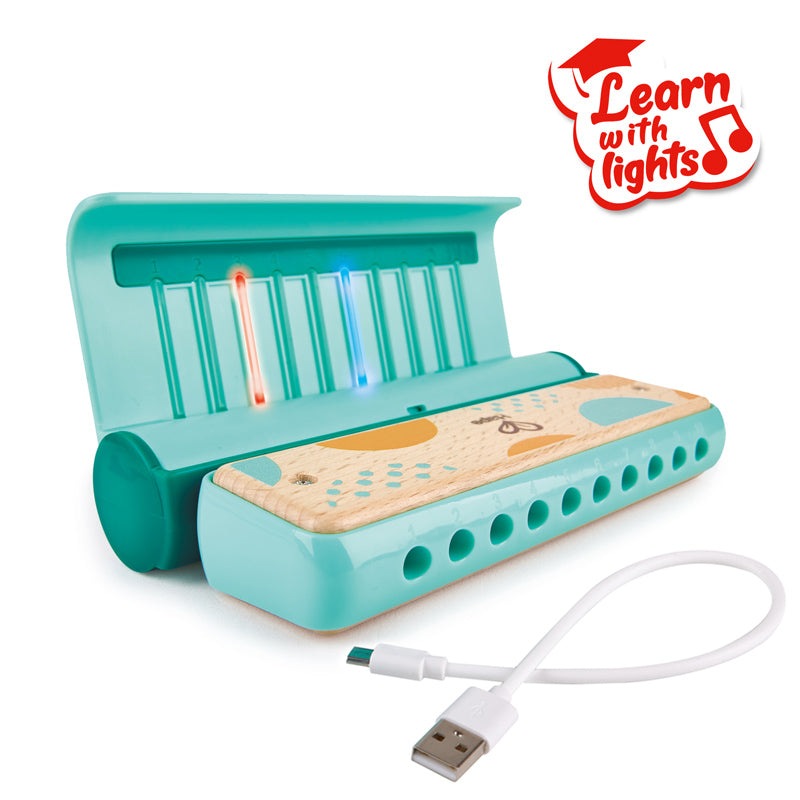 Hape Learn with Lights Harmonica toy in turquoise with illuminated red and blue keys and USB cable