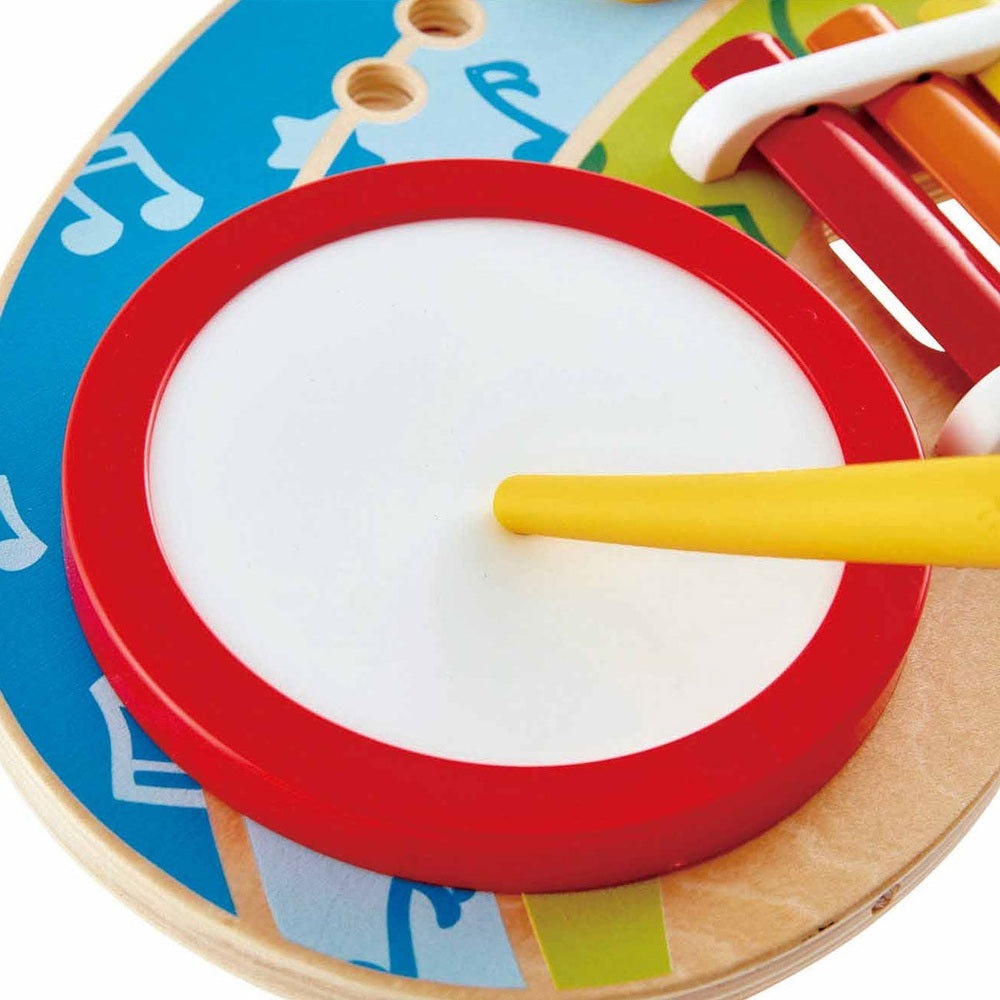 Hape Mighty Mini Band drum with red rim and yellow mallet, colorful wooden music toy