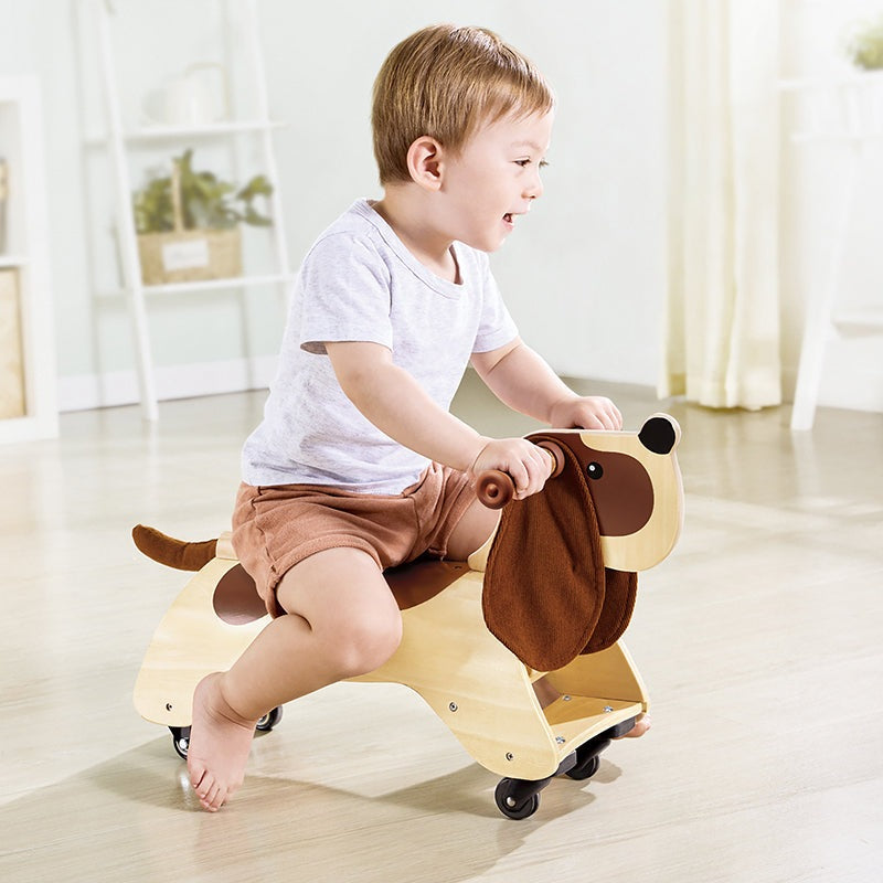 Hape ride-on dachshund wooden toy for toddlers with brown ears and wheels