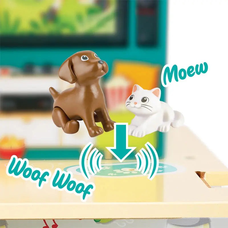 Hape Rock Slide House sound-effect toy with two figures: brown dog and white cat