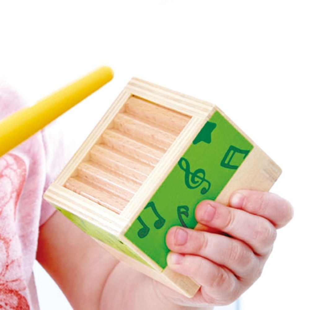 Hape Stacking Music Set wooden baby toy with light wood blocks and green panel