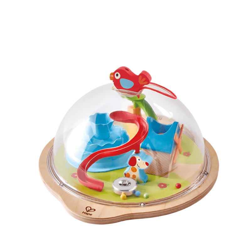 Hape Sunny Valley Adventure Dome toy under a clear dome on a wooden base with colorful animal figures