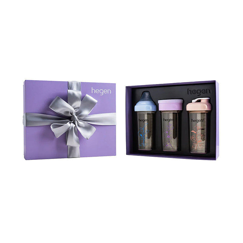 Hegen PCTO Floral Collection three-pack baby bottles in a purple gift box with blue, pink, and peach lids