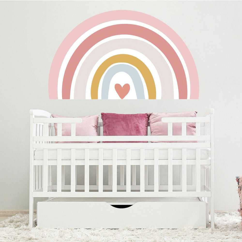 Hello Beautiful Designs pink rainbow nursery wall art sticker with pastel arches and heart above a white crib