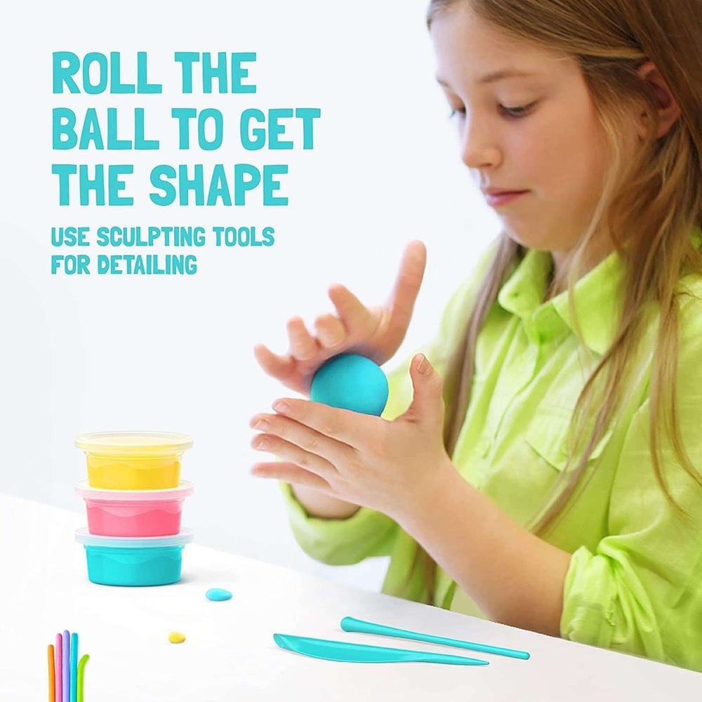 Hey Clay Poop Oops play dough set with turquoise sculpting tools and stacked colorful cups
