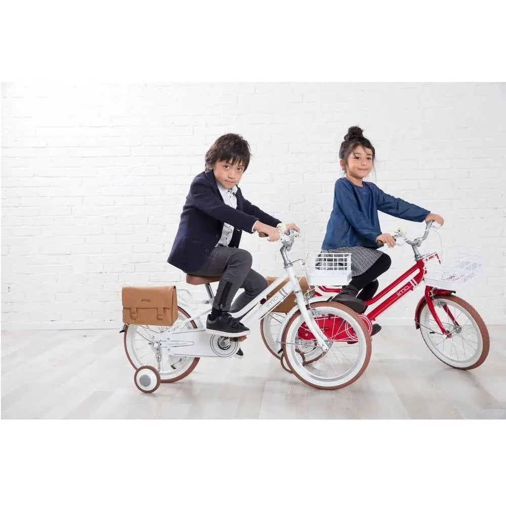 Iimo Kids Bicycle 16" two-child scene; white bike with tan saddlebag and rear rack, red bike with front basket, kids riding indoors.