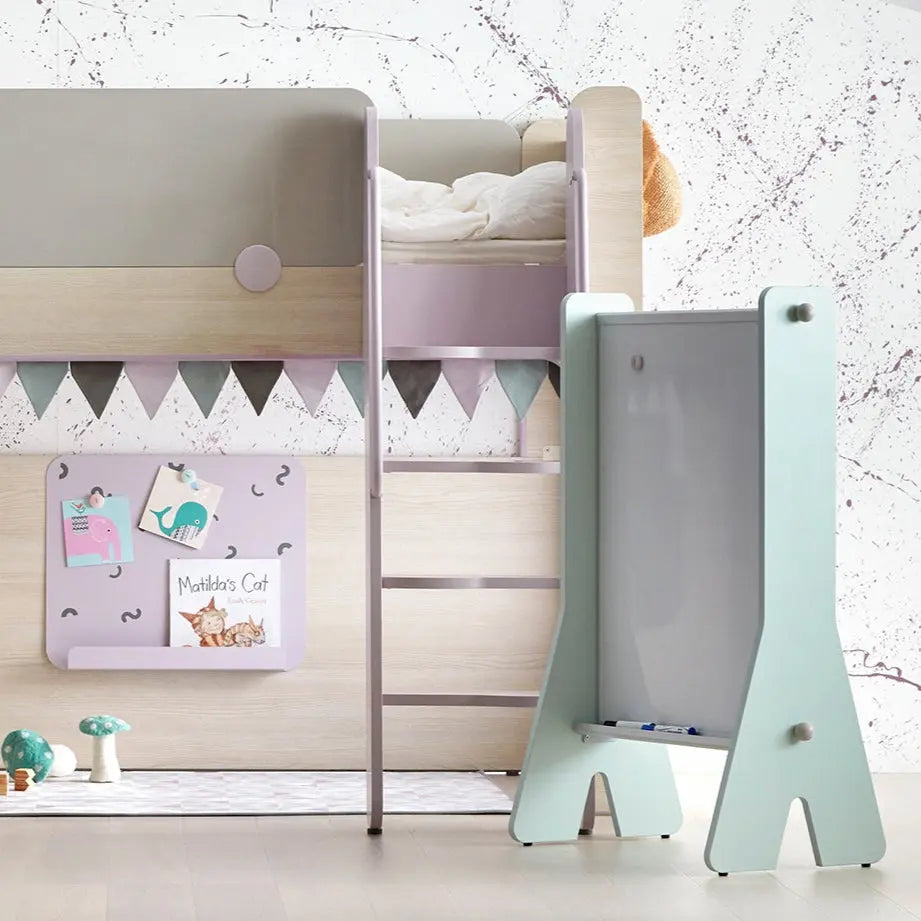 Iloom Cabin White Board easel in mint green with chalkboard surface and marker tray beside pastel bunk bed.