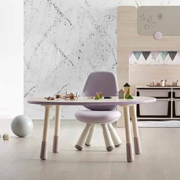 Iloom Growing Desk Peanut 1200W activity table with lavender chair, kids play with wooden blocks.