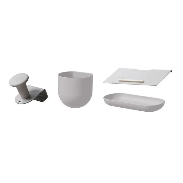 Iloom Jerome Motion Desk components in light gray: clamp, cup holder, tray, and writing board arranged for organized workspace.
