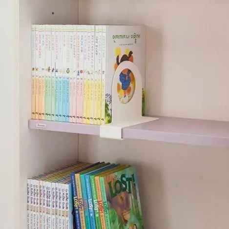 Iloom Linki Plus Bookend (2Ea) keeps colorful books upright on a white shelf.