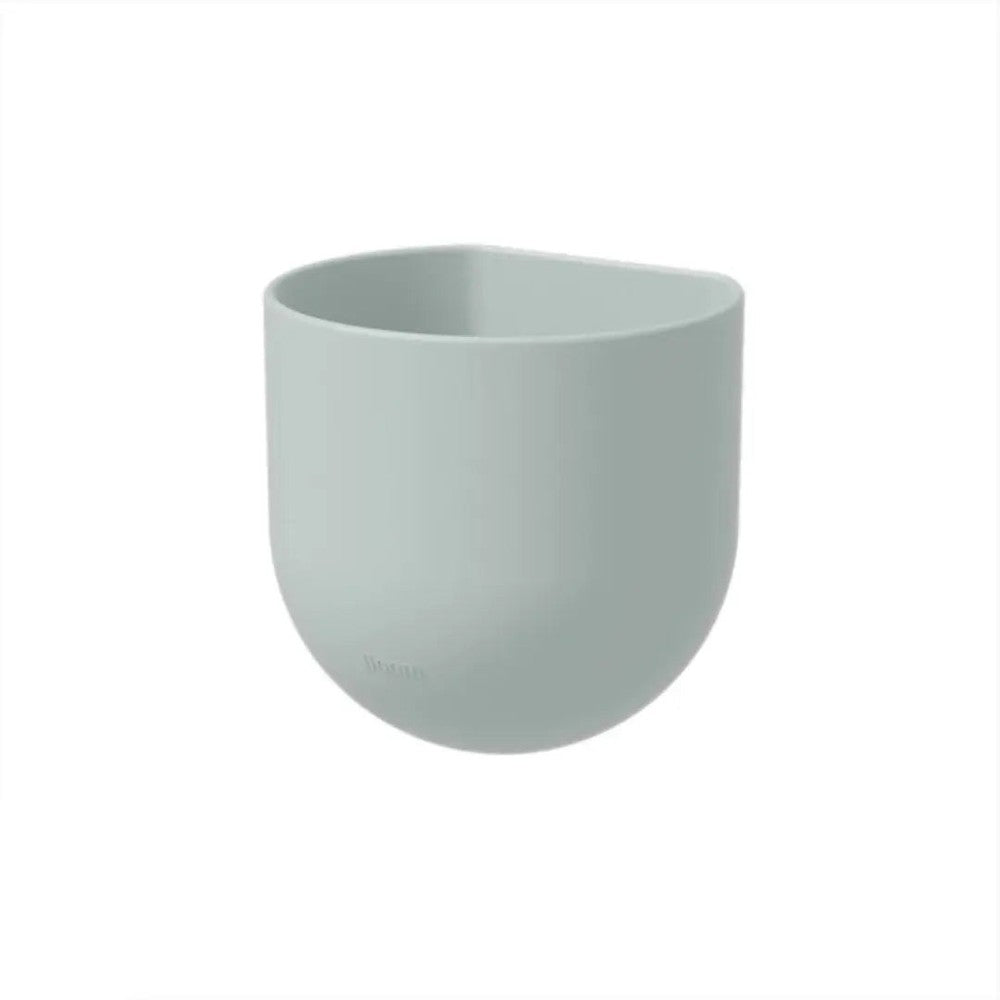 Iloom Linki Plus multipurpose pencil holder in mint ceramic, standing upright on a calm desk.