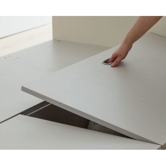 Iloom Tiede Bed with white storage lift-top panel for a toddler bed.