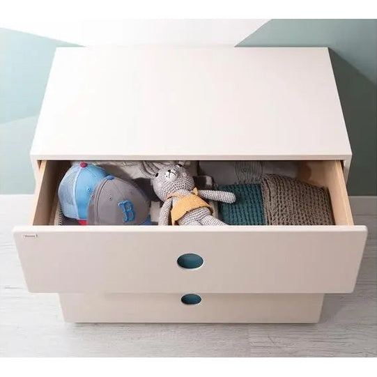 ILOOM Tinkle Pop 3 Drawer Dresser 800W, white, top drawer open showing toys and clothing in a neat storage setup.