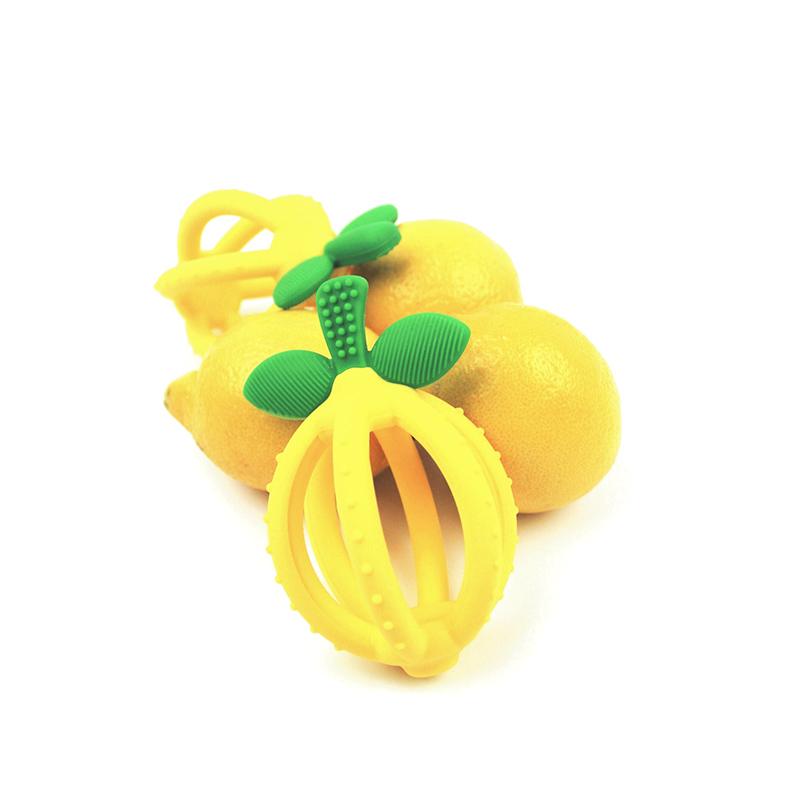 Itzy Ritzy Bitzy Biter Lemon Ball Teether, yellow lemon with green leaves, plastic baby teething toy