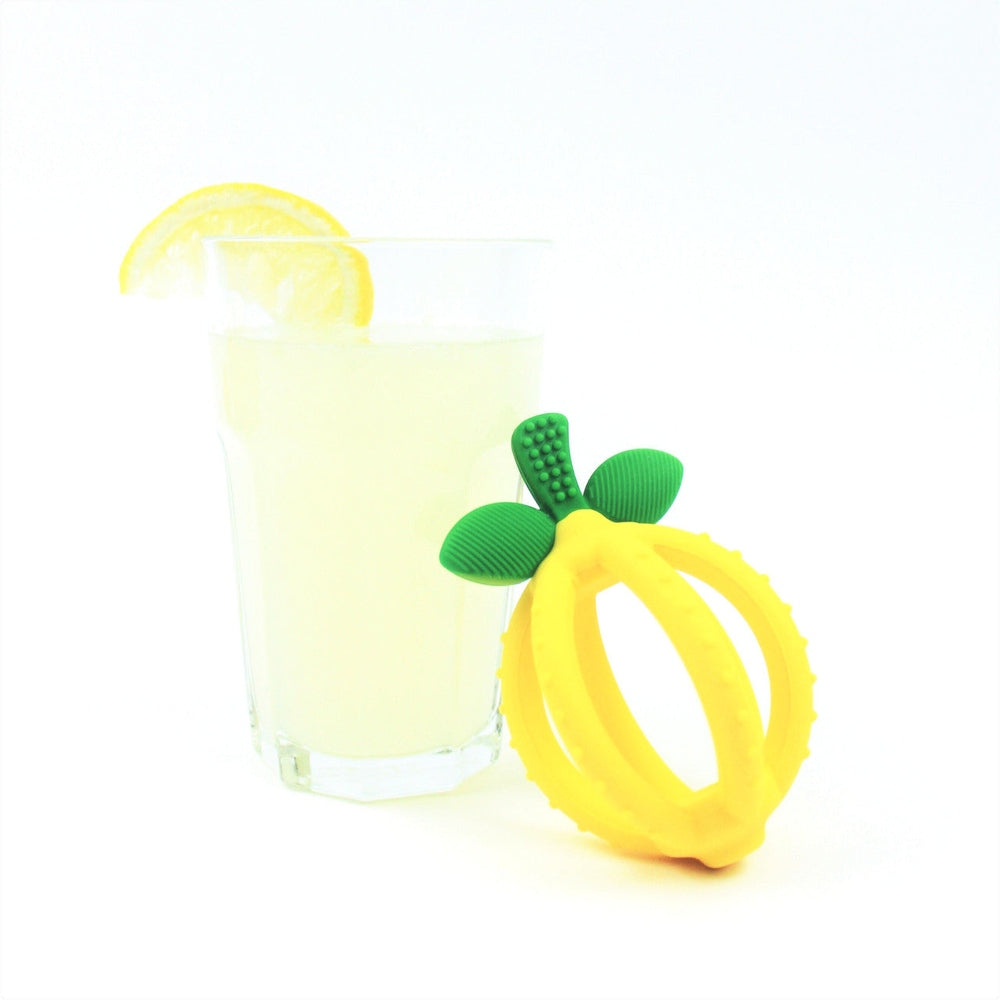 Itzy Ritzy Bitzy Biter Lemon Ball Teether, yellow silicone ring with green leaf accents