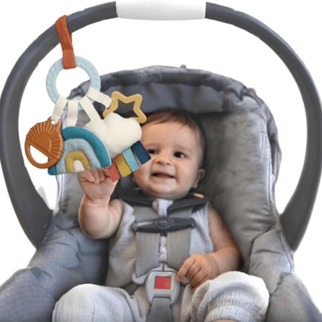 Itzy Ritzy Bitzy Busy Ring teething activity toy with colorful soft fabric shapes for baby