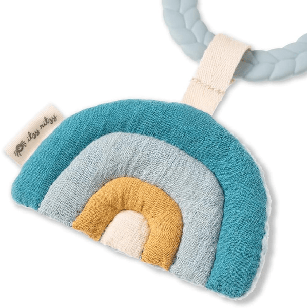 Itzy Ritzy Bitzy Busy Ring teething toy with teal, gray, and mustard rainbow arches on a cream strap