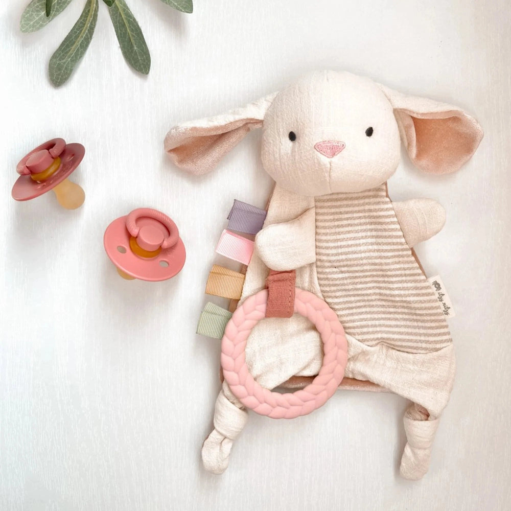 Itzy Ritzy Bitzy Crinkle Sensory Toy Bunny with pink teether ring and pastel ribbons