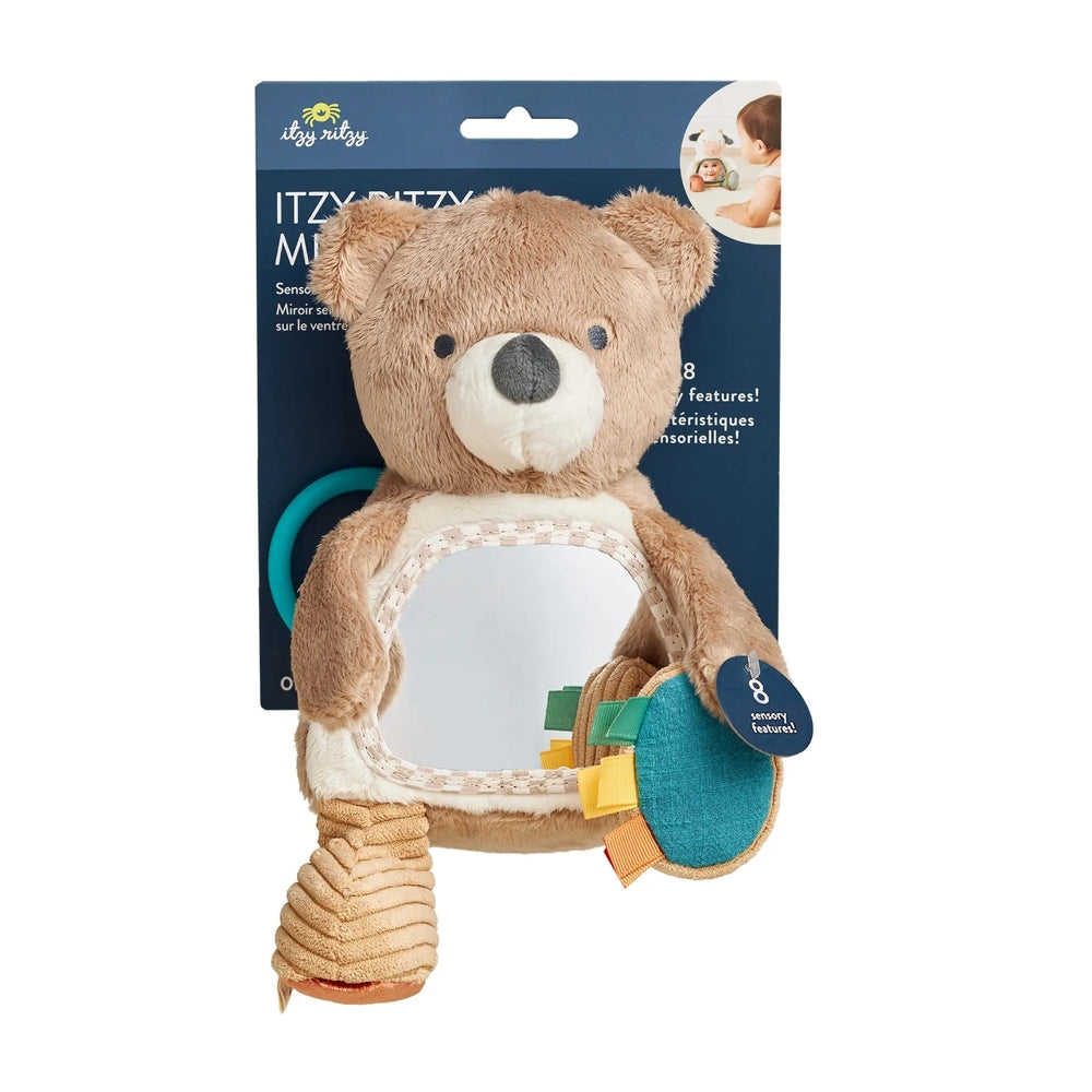 Itzy Ritzy Bitzy Mirror Theo the Bear baby activity toy, soft brown plush with a mirrored tummy and colorful paw tabs.